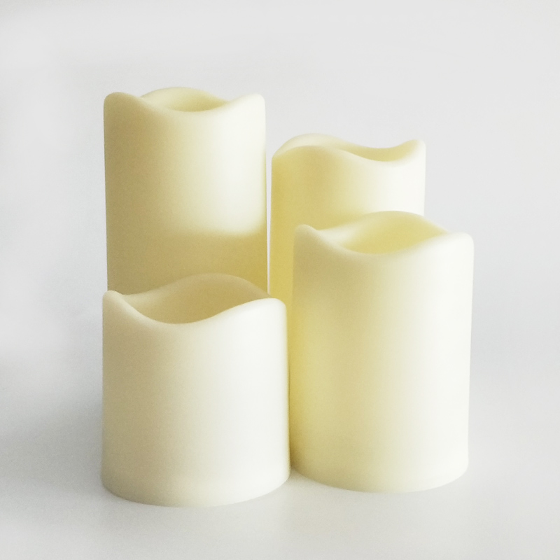 Sef of 4 ivory Led pillar candle melted top frosted